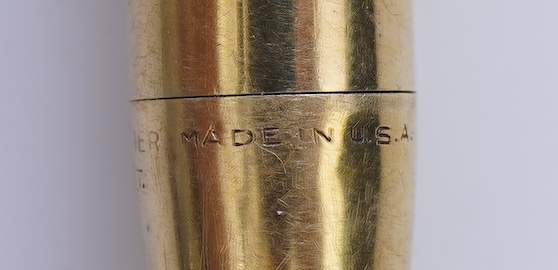 Cartier, a gold-cased propelling pencil/lighter, mid 20th century